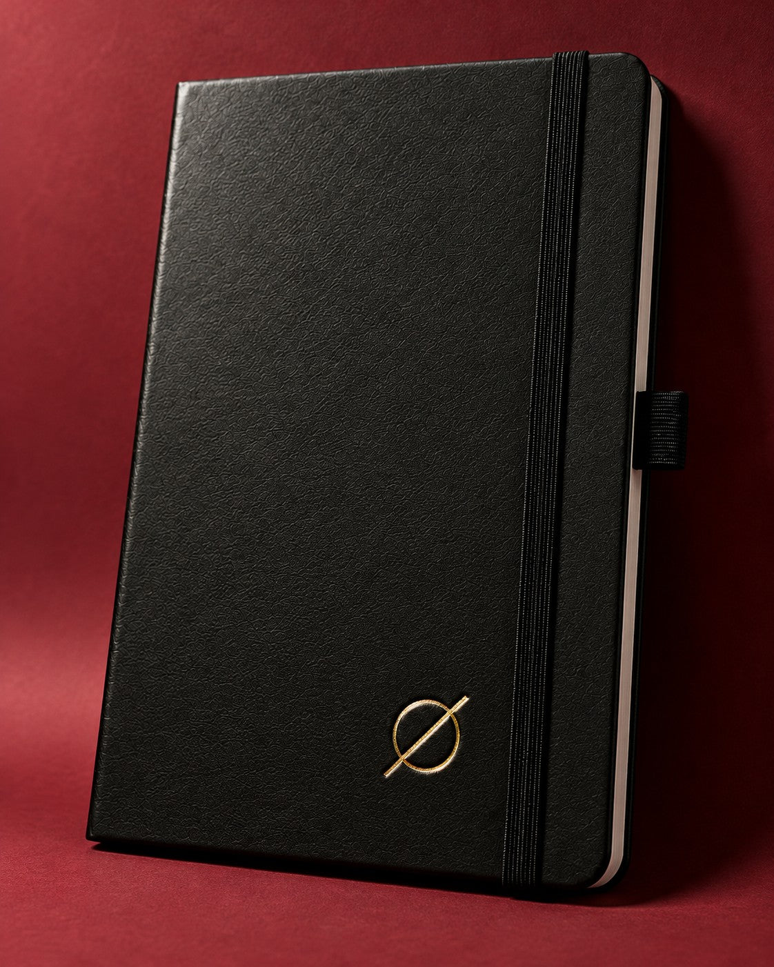 Black Infinote Classic notebook with a gold foil mark debossed into the cover